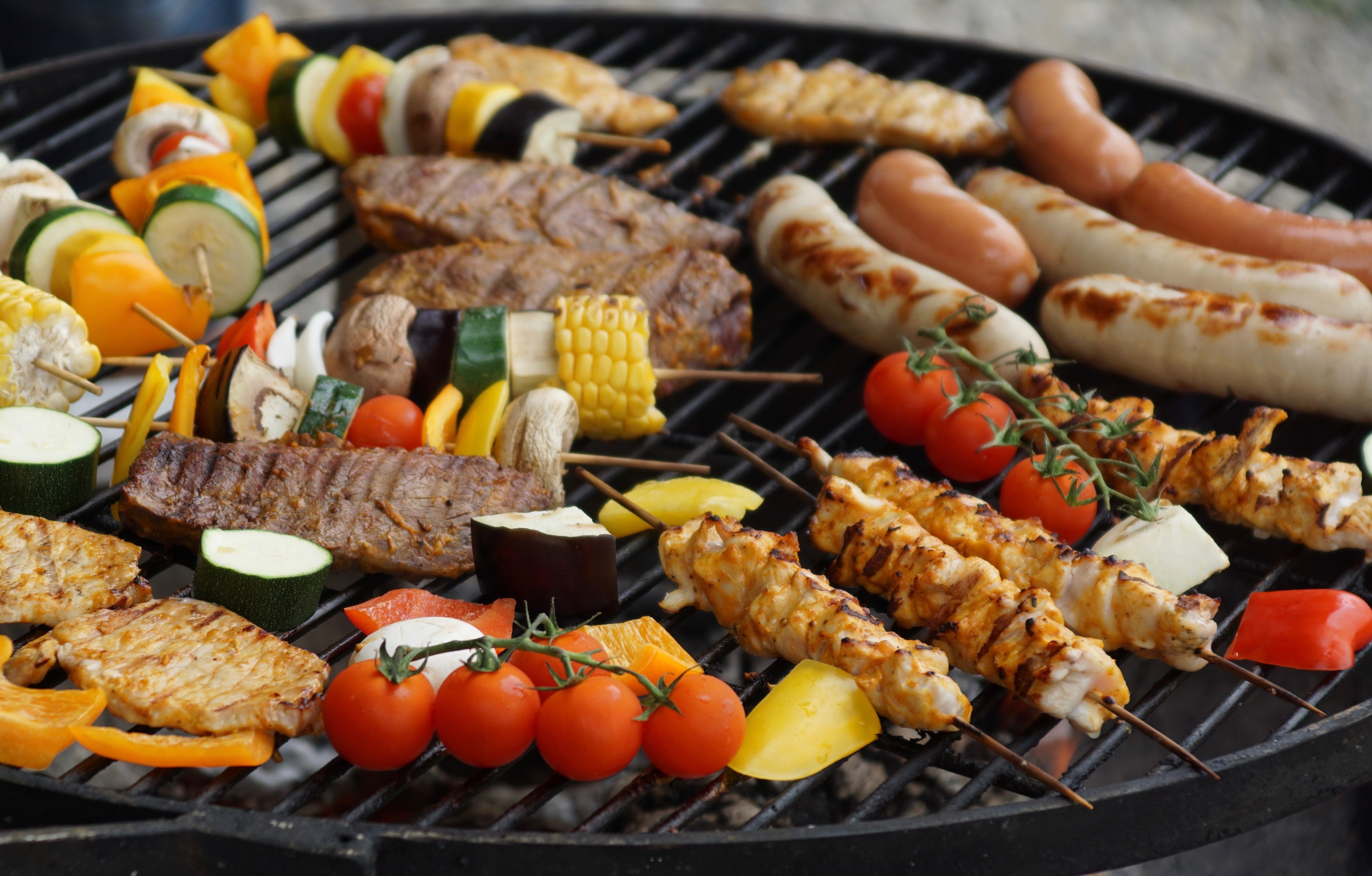 Food being grilled on a clean grill.