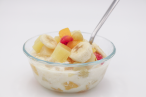 EFNEP Easy Fruit Salad recipe in a bowl with a spoon