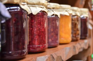 food preserved in clear mason jars, sealed up