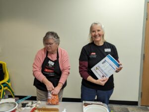 Extension Master Food Volunteers (l-r) Margarete O'Leary and Maria Knapik assisting at Med Instead of Meds healthy eating series.