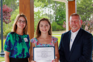 from left to right: Savanna Sillings (Teen Court Program Assistant), Keona Warren (scholarship recipient) and Sam Davis (Teen Court Director)